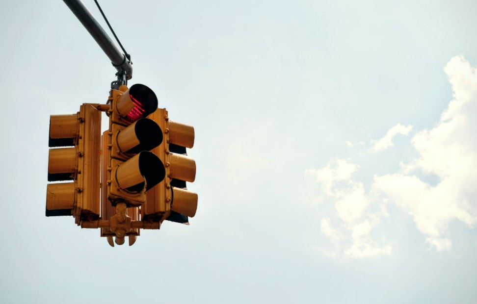Who Has Priority When Traffic Lights Are Out of Order? The Business View